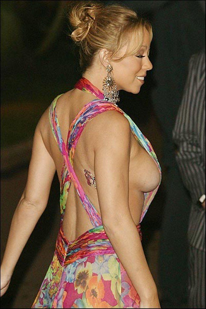 Mariah carey flaunts boobs